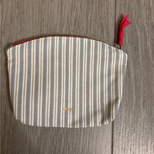 Ipsy bag - blue stripes. EUC.